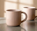 Two ribbed ceramic coffee mugs with modern fluted texture | Lollygag