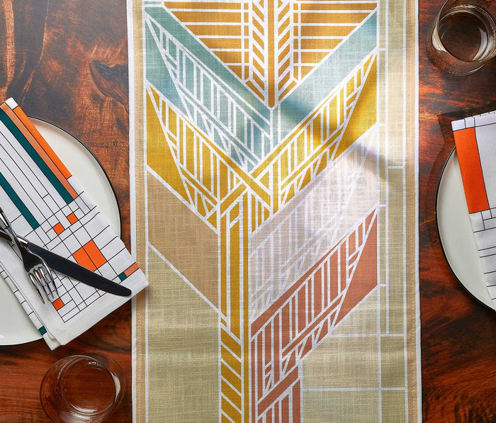 Frank Lloyd Wright Dana Sumac table runner featuring mid-century modern Sumac pattern design laid across dining table