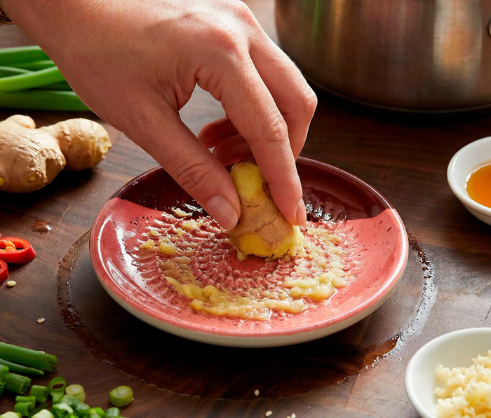 Grating ginter in a small pink grate plate - Lollygag