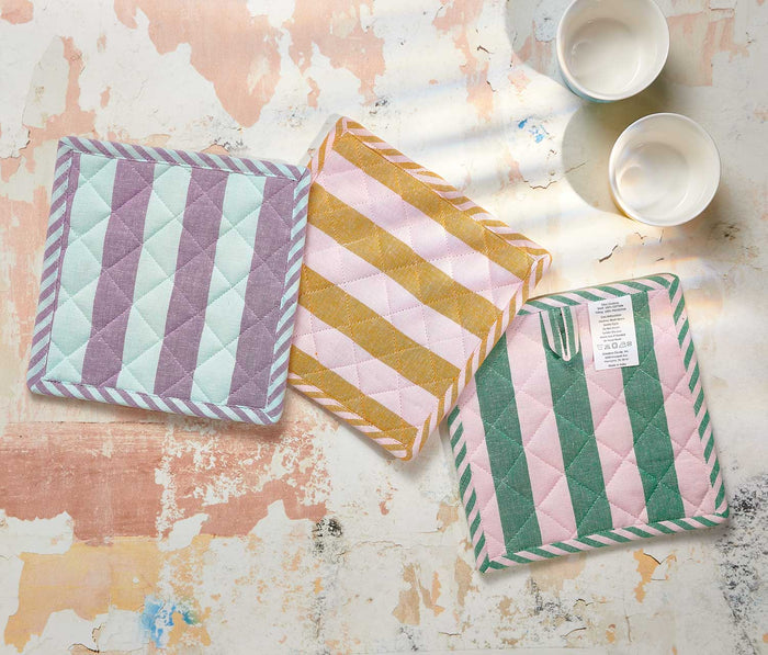 Three square woven cotton potholders in striped pink, mint green, plum, and ochre yellow, displayed together as a kitchen gift set. - Lollygag